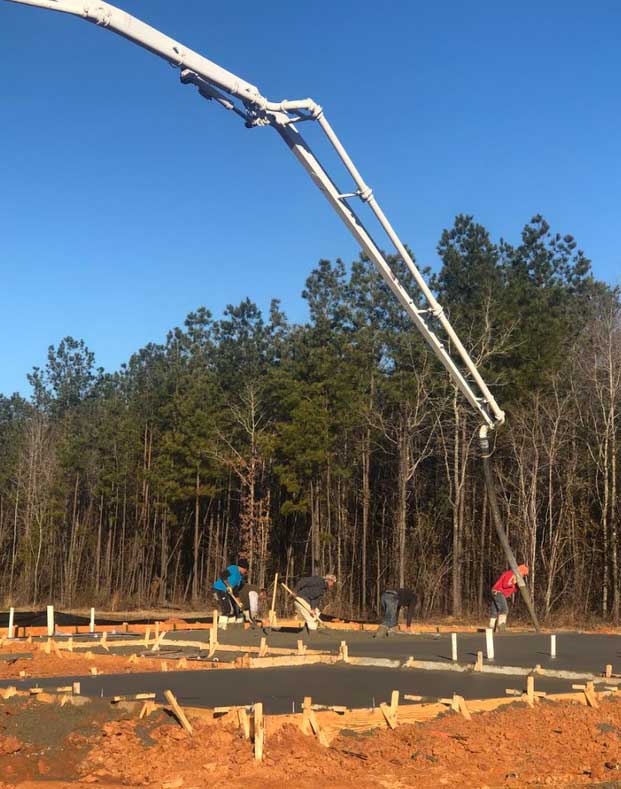 Concrete pouring at a construction site for a commercial build outs